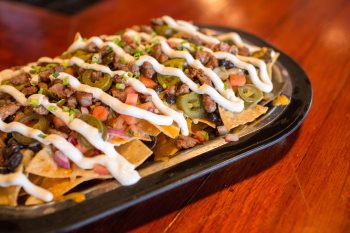 Loaded nachos on a skillet